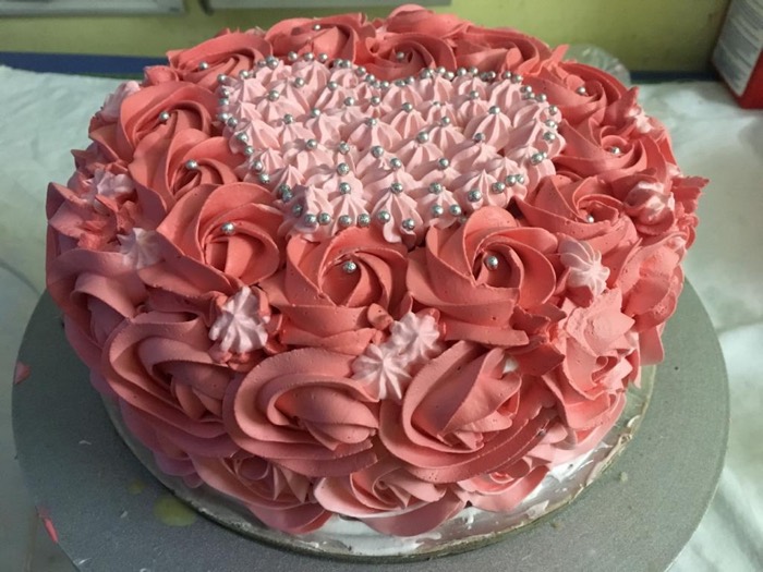 Rose garden with a piped heart